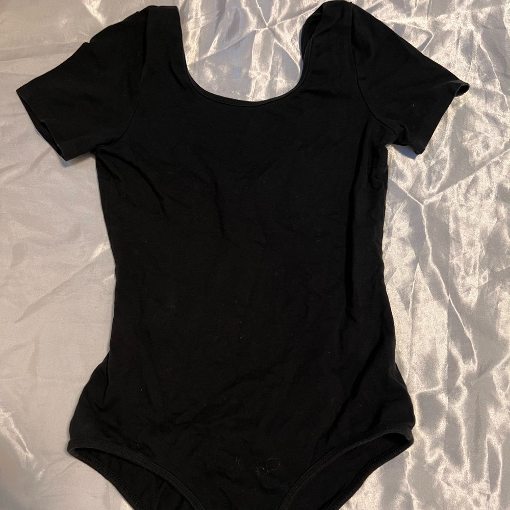 super soft stretchy breathable black bodysuit, scoop neck and low back
